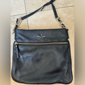 Genuine Kate Spade black leather crossbody bag. Sleek and great for travel